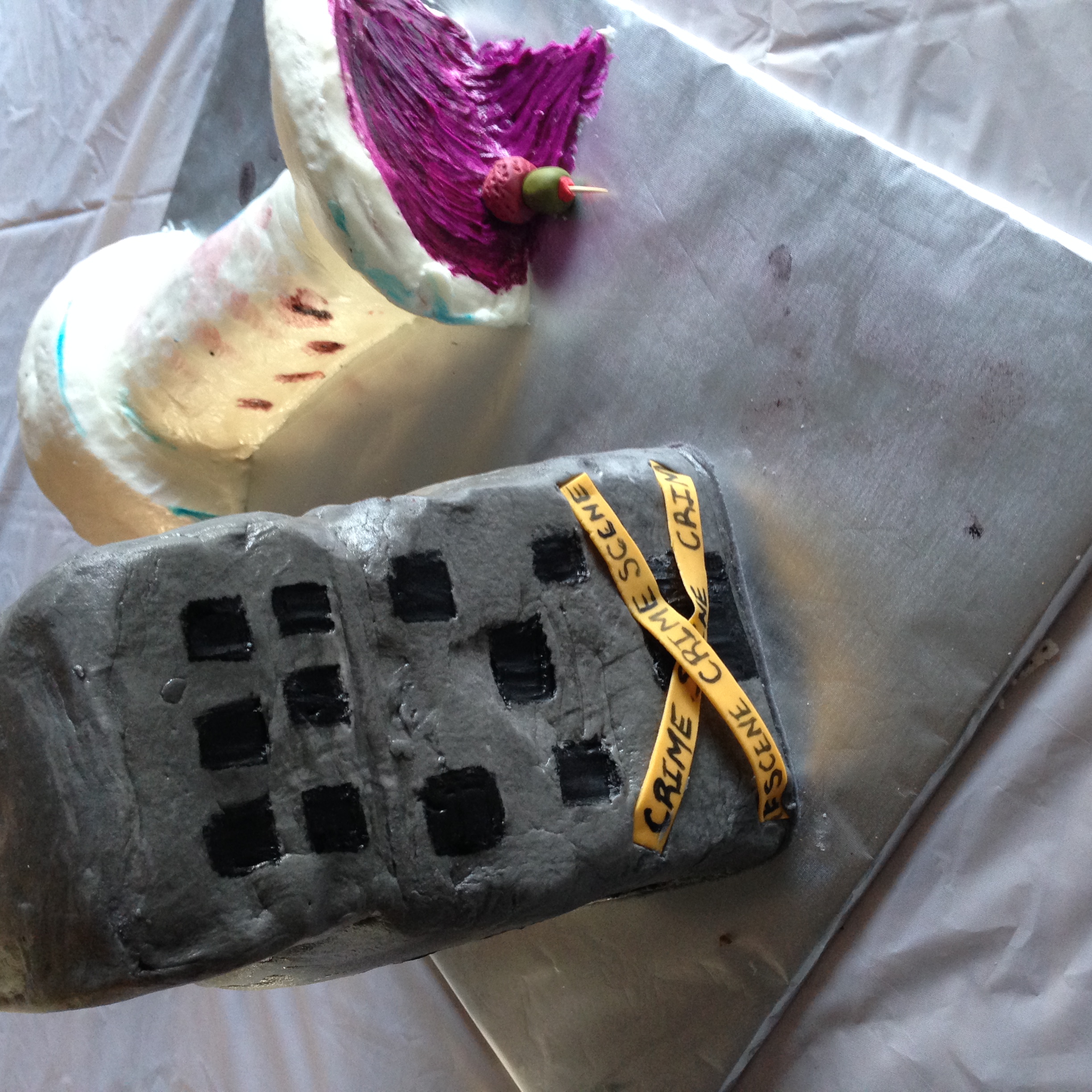 Skyscraper cake and bloody martini glass.